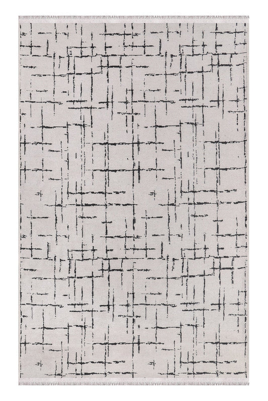 Rug with abstract black pattern on a white background