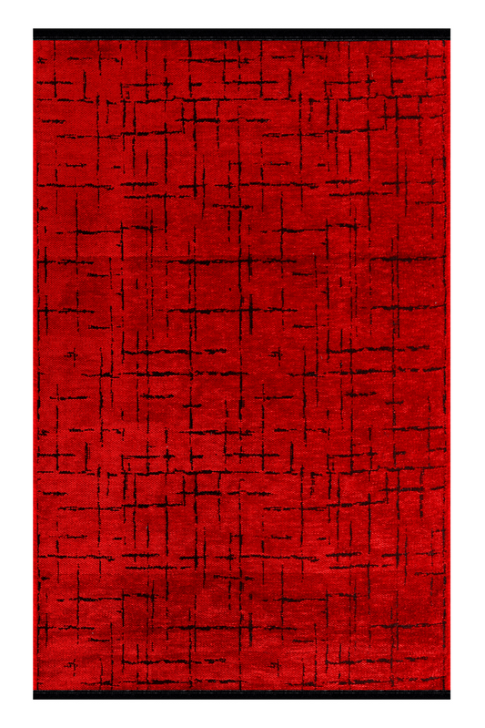 Red rug with black abstract pattern on a white background